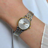 Γυναικείο ρολόι Raymond Weil Toccata Diamonds 5985-STP-65081 με δίχρωμο μπρασελέ σε ασημί-χρυσό χρώμα και ασημί καντράν 29mm με διαμάντια.