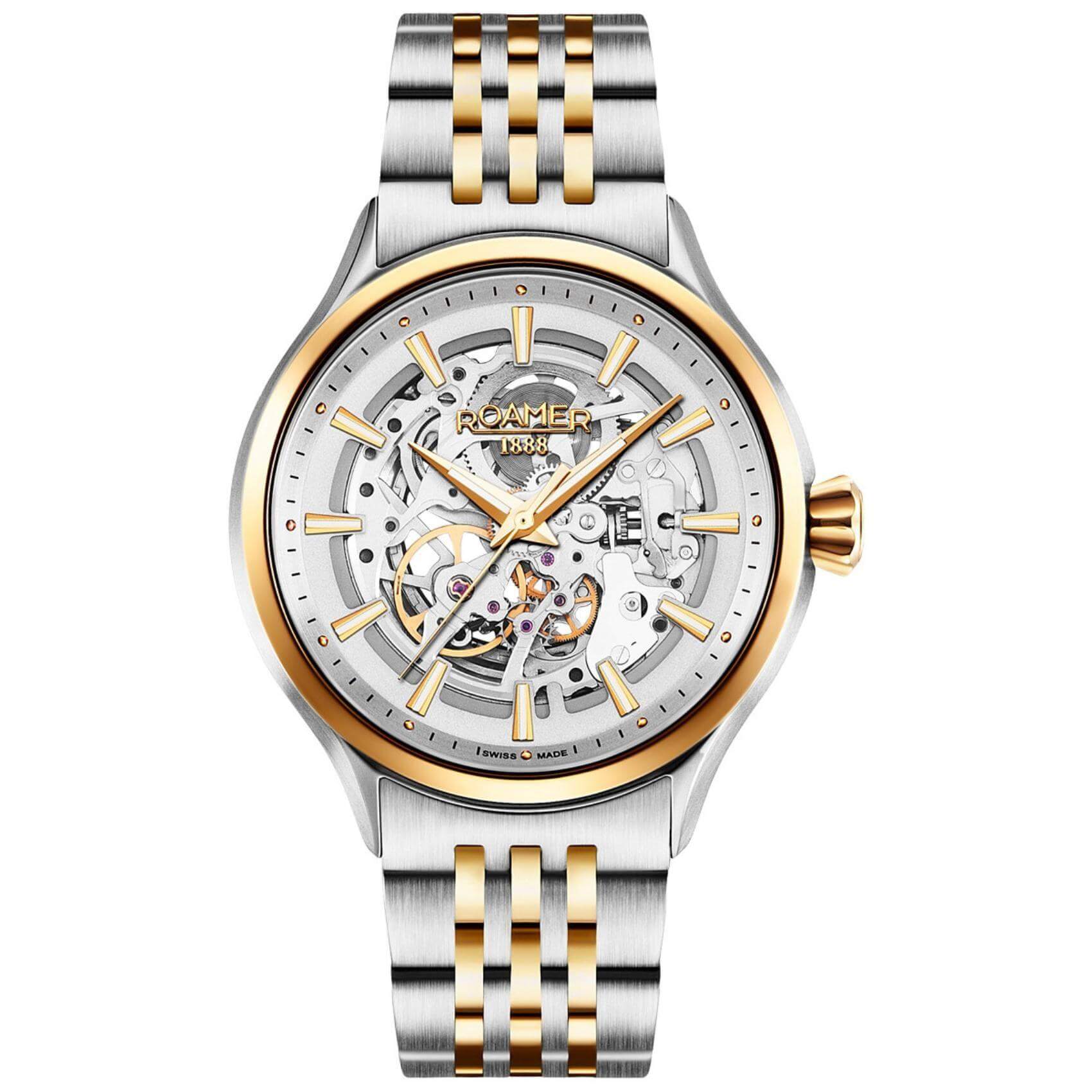 Αυτόματο Ρολόι Skeleton Roamer Competence III 101663-47-15-10 με  δίχρωμο ασημί-χρυσό ατσάλινο μπρασελέ διάφανο ασημί καντράν, τζαμάκι από ζαφείρι και στεφάνι διαμέτρου 43mm.