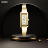 Γυναικείο ρολόι Roamer Elegance Diamond 866845-48-35-20 με χρυσό ατσάλινο μπρασελέ και χρυσό τετράγωνο φίλντισι καντράν διαμέτρου 32mm με διαμάντια.
