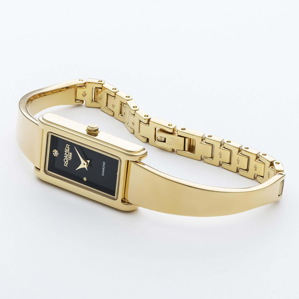 Γυναικείο ρολόι Roamer Elegance Diamond 866845-48-55-20 με χρυσό ατσάλινο μπρασελέ και μαύρό τετράγωνο φίλντισι καντράν διαμέτρου 32mm με διαμάντια.