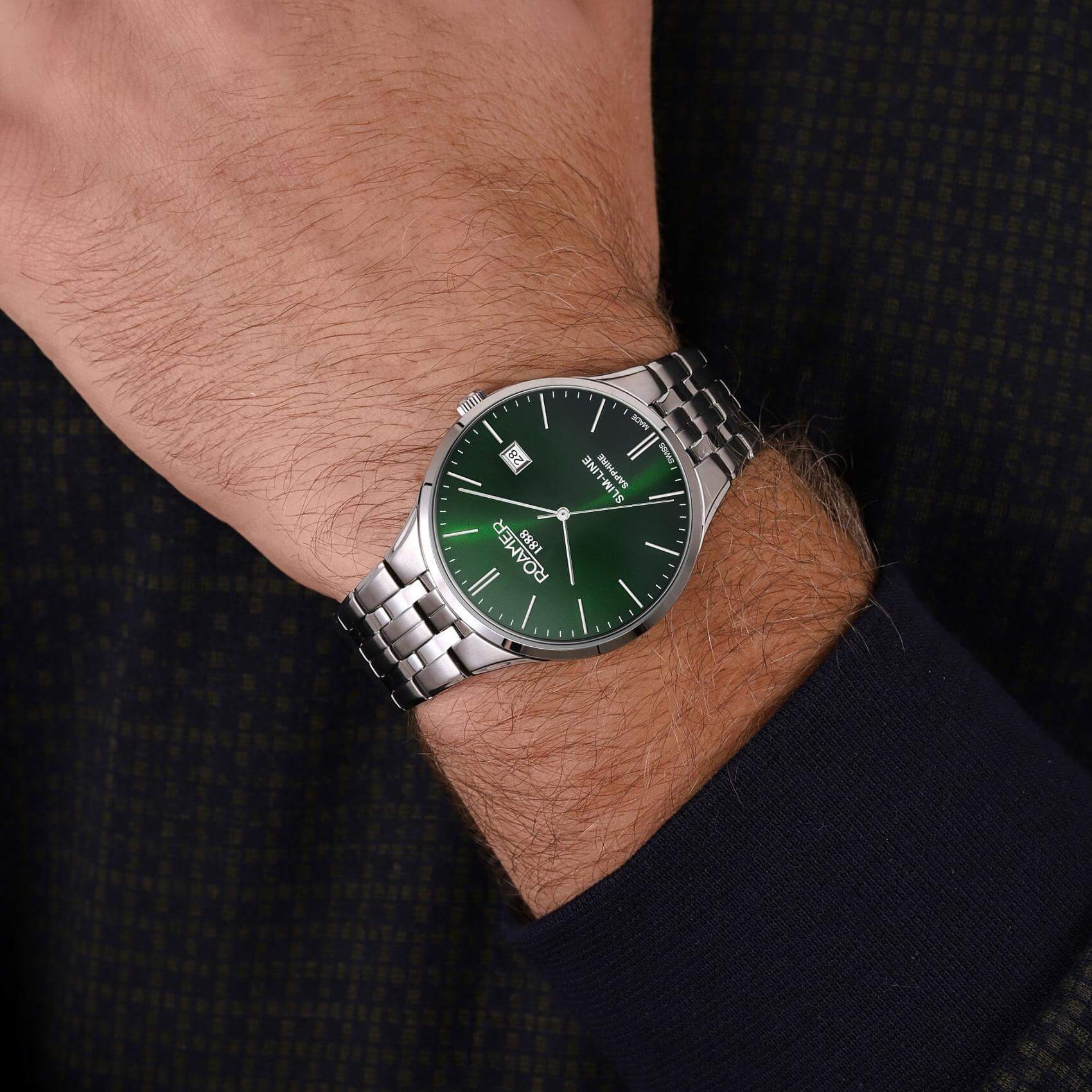 Ρολόι Roamer Slim Line 512833-41-75-20 με ασημί μπρασελέ, πράσινο καντράν με ένδειξη ημερομηνίας και διάμετρο στεφανιού 40mm.