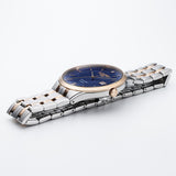 Ρολόι Roamer Slim Line Diamond 864833-49-45-50 με δίχρωμο ροζ χρυσό-ασημί μπρασελέ, μπλε καντράν με διαμάντι και διάμετρο στεφανιού 40mm.