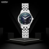 Γυναικείο ρολόι Roamer Soleure Diamond 547857-41-85-50 με ασημί ατσάλινο μπρασελέ και μπλε φίλντισι καντράν διαμέτρου 30mm με διαμάντια.