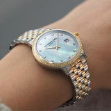 Γυναικείο ρολόι Raymond Weil Toccata Diamonds 5985-SP5-97081 με δίχρωμο μπρασελέ και άσπρο φίλντισι καντράν 29mm με διαμάντια.