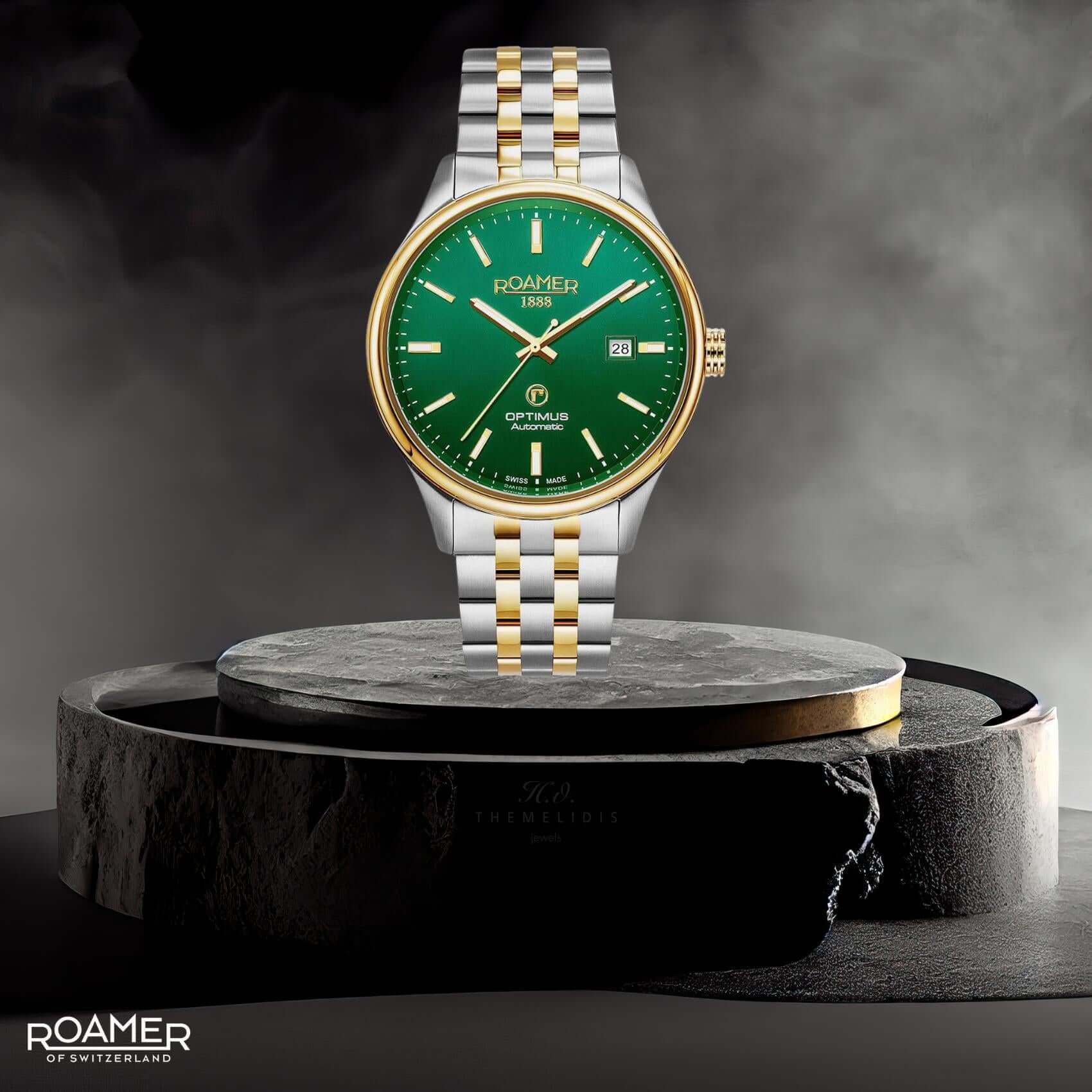 Ανδρικό ρολόι Roamer Optimus 983983-47-75-50 με δίχρωμο ατσάλινο μπρασελέ σε ασημί-χρυσό χρώμα και πράσινο καντράν 42mm με ένδειξη ημερομηνίας.