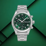 Timberland Ashmont TDWGK0082604 σε studio background με ασημί ατσάλινο μπρασελέ και πράσινο καντράν.