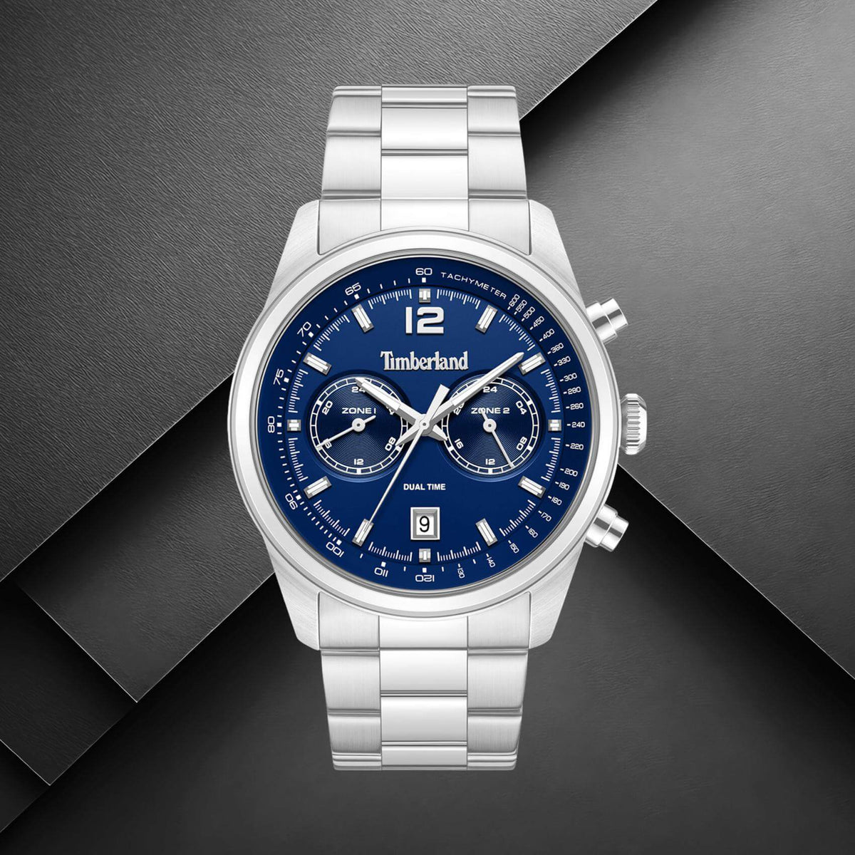 Timberland Northbridge TDWGK0094403 σε studio background με ασημί ατσάλινο μπρασελέ και μπλε καντράν.