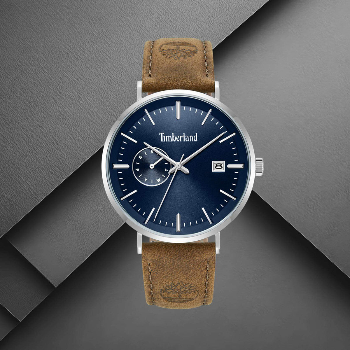 Timberland Rangeley TDWGF0094501 σε studio background με καφέ δερμάτινο λουράκι και μπλε καντράν.