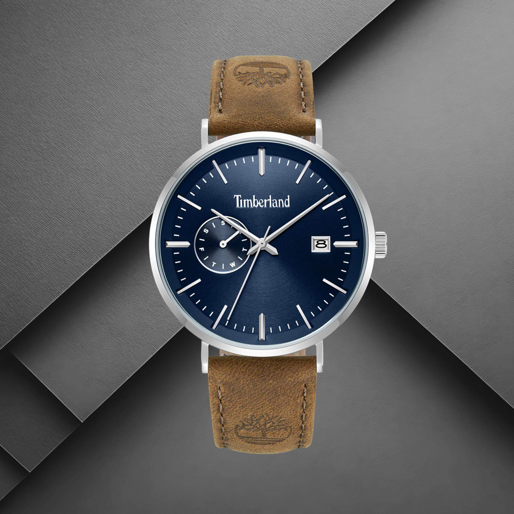 Timberland Rangeley TDWGF0094501 σε studio background με καφέ δερμάτινο λουράκι και μπλε καντράν.