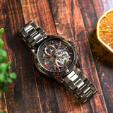 Αντρικό ρολόι Tommy Hilfiger Henry 1710479 με ανθρακί ατσάλινο μπρασελέ και ανθρακί διάφανο skeleton καντράν διαμέτρου 44mm.