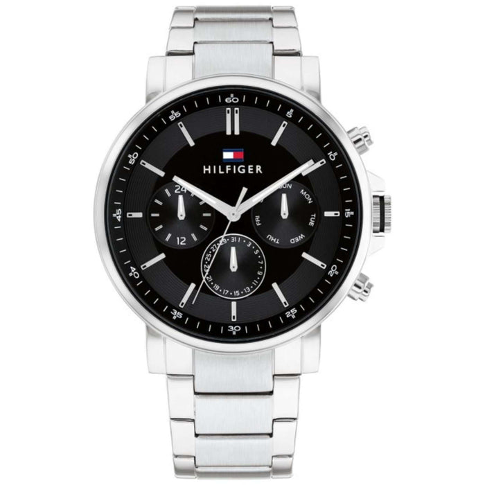Ανδρικό ρολόι Tommy Hilfiger Tyson 1710667 που συνδυάζει ασημί ατσάλινο μπρασελέ και μαύρο καντράν διαμέτρου 44mm.