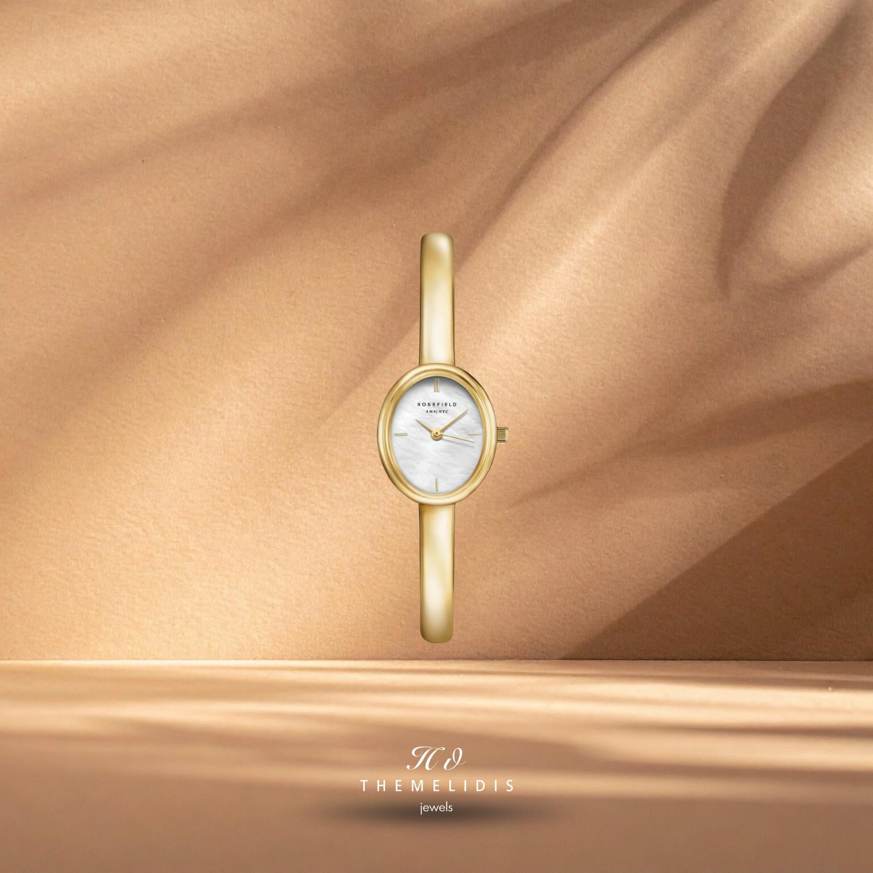 Γυναικείο ρολόι Rosefield Bangle XS STWGSG-ST06 με λευκό φίλντισι καντράν, οβάλ κάσα 19.5mm, χρυσό ατσάλινο μπρασελέ και στεγανότητα 3 ATM
