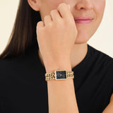 Γυναικείο ρολόι Rosefield Studio Double Chain SBGSG-O77 με χρυσό ατσάλινο μπρασελέ σε σχήμα βραχιολιού με διπλή αλυσίδα και μαύρο καντράν σε οκτάγωνο σχήμα μεγέθους 19.5mmX24mm.