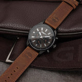 Αντρικό ρολόι Timberland Demarest TDWGF2100402 με καφέ δερμάτινο λουράκι και μαύρο καντράν διαμέτρου 45mm με ημέρα-ημερομηνία.