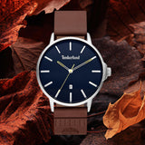 Ανδρικό ρολόι Timberland Rollinsford TBL15637JYS/03 με καφέ δερμάτινο λουράκι και μπλε καντράν διαμέτρου 42mm με ημερομηνία.