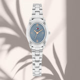 Γυναικείο ρολόι Tommy Hilfiger Demi 1782873 με μπλε οβάλ καντράν με διάσταση 19.7mm, χρυσούς δείκτες και ασημί μπρασελέ.