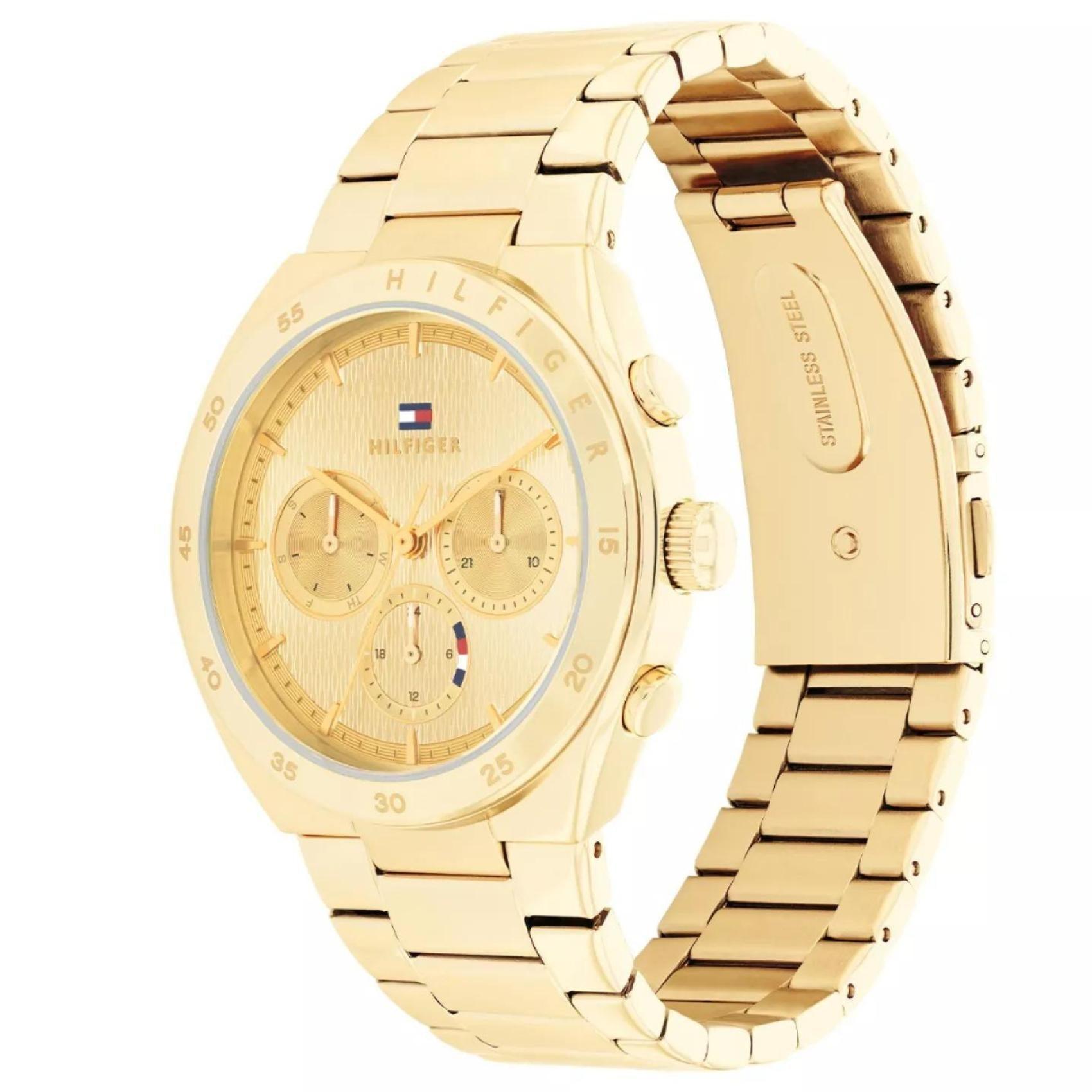 Γυναικείο ρολόι Tommy Hilfiger Carrie 1782575 με χρυσό ατσάλινο μπρασελέ και χρυσό καντράν διαμέτρου 38mm με ημέρα-ημερομηνία.