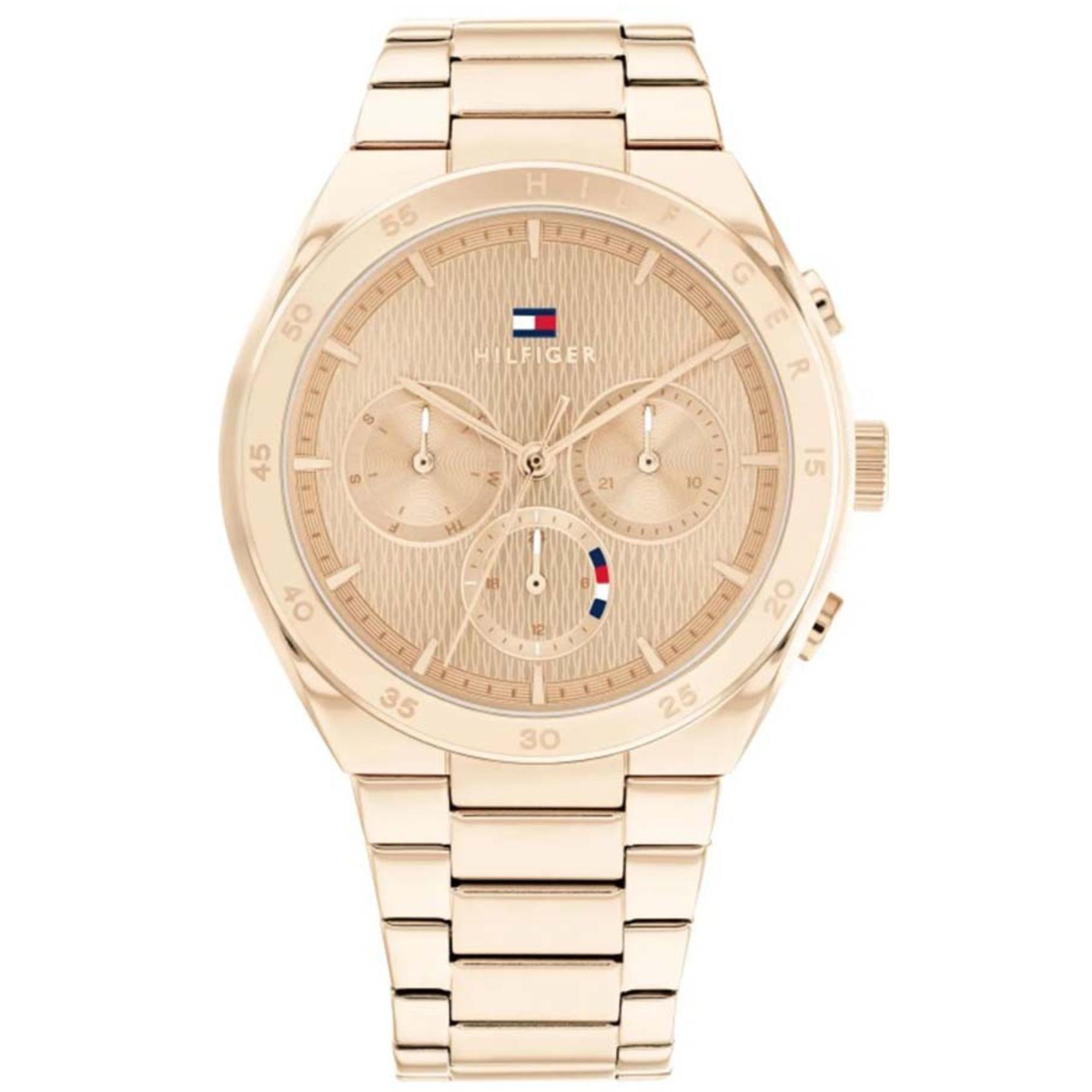 Γυναικείο ρολόι Tommy Hilfiger Carrie 1782577 με ροζ χρυσό ατσάλινο μπρασελέ και ροζ χρυσό καντράν διαμέτρου 38mm με ημέρα-ημερομηνία.