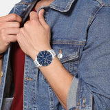 Αντρικό ρολόι Tommy Hilfiger Jimmy 1791949 με ασημί ατσάλινο μπρασελέ και μπλε καντράν διαμέτρου 44mm.