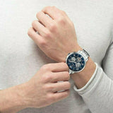 Αντρικό ρολόι Tommy Hilfiger Keagan 1791293 χρονογράφος με ασημί ατσάλινο μπρασελέ και μπλε καντράν διαμέτρου 44mm.