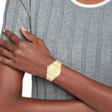 Γυναικείο ρολόι Tommy Hilfiger Monica 1782592 με χρυσό ατσάλινο μπρασελέ και χρυσό καντράν διαμέτρου 38mm με ημέρα-ημερομηνία.