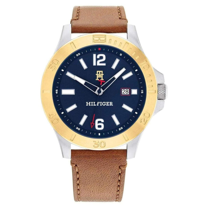 Ρολόι Tommy Hilfiger Ryan 1710529, με καφέ δερμάτινο λουράκι και μπλε καντράν διαμέτρου 46mm με ένδειξη ημερομηνίας.