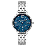 Γυναικείο ρολόι Vogue Caroline 2020613282 με ασημί ατσάλινο μπρασελέ και μπλε καντράν διαμέτρου 34mm με ημερομηνία.
