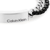 Ατσάλινο βραχιόλι Calvin Klein 35000566 σε ασημί με μαύρο χρώμα και σχέδιο μπρασελέ με ασημί μαγνητικό κούμπωμα.