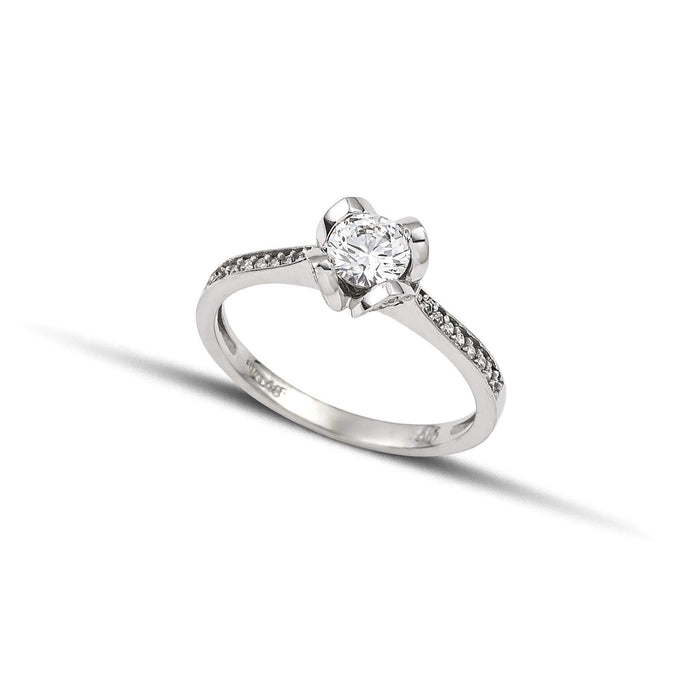 Μονόπετρο δαχτυλίδι Κ14 λευκόχρυσο με πλαϊνές πέτρες