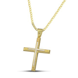 Χρυσός σταυρός Κ14 για άντρα, με ανάγλυφη όψη και λευκόχρυσο. Φορεμένος σε κλασσική αλυσίδα.