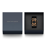 Θήκη smartwatch daniel wellington dw01200002 συμβατή με Apple Watch Series 6, 5, 4 και Apple Watch SE σε ροζ χρυσό χρώμα με μαύρο καουτσούκ λουράκι και τετράγωνο σχήμα.