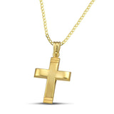 Χρυσός σταυρός 14 καρατίων με γυαλιστερή επιφάνεια. Γυναικείο  χειροποίητο κόσμημα, φορεμένο σε κλασσική αλυσίδα.