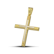 Γυναικείος σταυρός από χρυσό Κ14. Ανάγλυφο σχέδιο με λευκόχρυση λεπτομέρεια.  Φορεμένος σε μοντέλο.