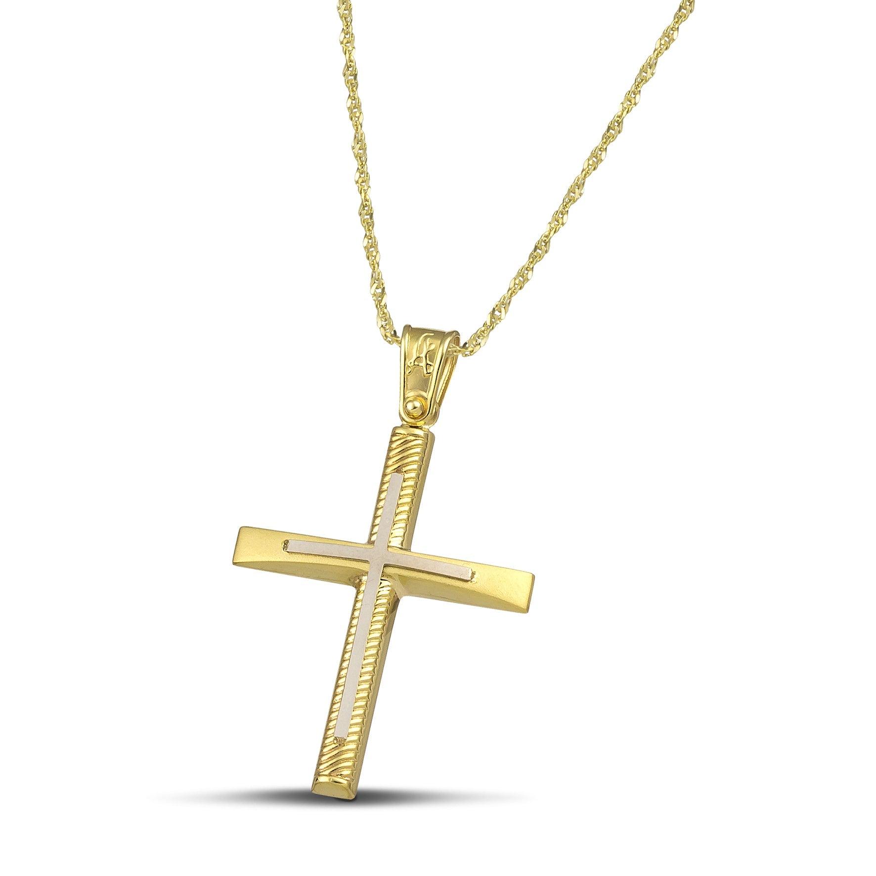 Σταυρός βάπτισης χρυσός Κ14 για γυναίκα. Διαθέτει σκαλιστά σχέδια και λευκόχρυσο σταυρό, με λεπτή, στριφτή αλυσίδα.