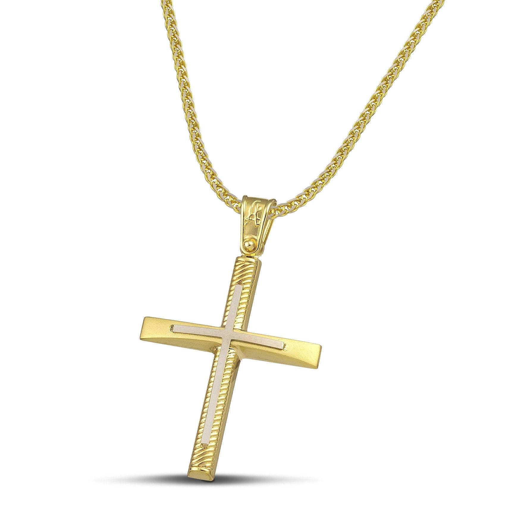 Σταυρός βάπτισης χρυσός Κ14 για γυναίκα. Διαθέτει σκαλιστά σχέδια και λευκόχρυσο σταυρό, με πυκνή αλυσίδα.