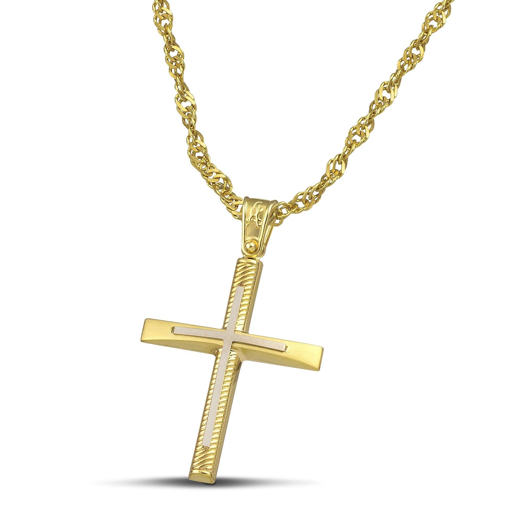Σταυρός βάπτισης χρυσός Κ14 για γυναίκα. Διαθέτει σκαλιστά σχέδια και λευκόχρυσο σταυρό, με στριφτή αλυσίδα.