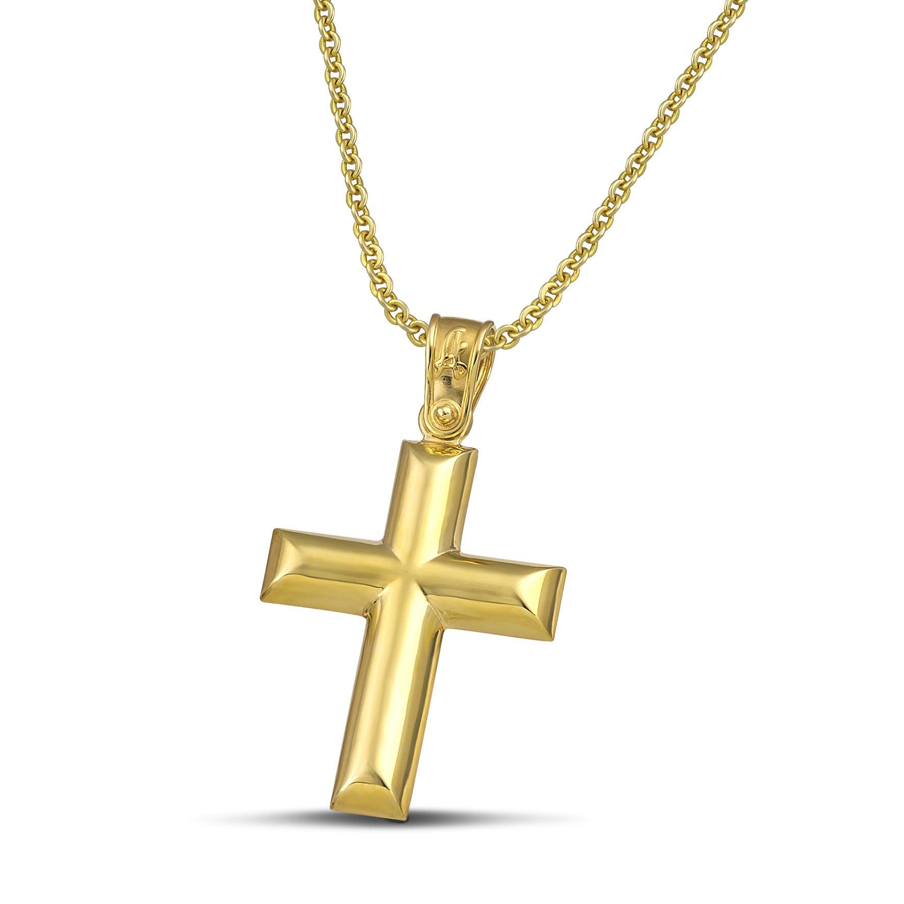Κλασσικός σταυρός από χρυσό Κ14 για γυναίκα, φορεμένος σε λεπτή αλυσίδα.
