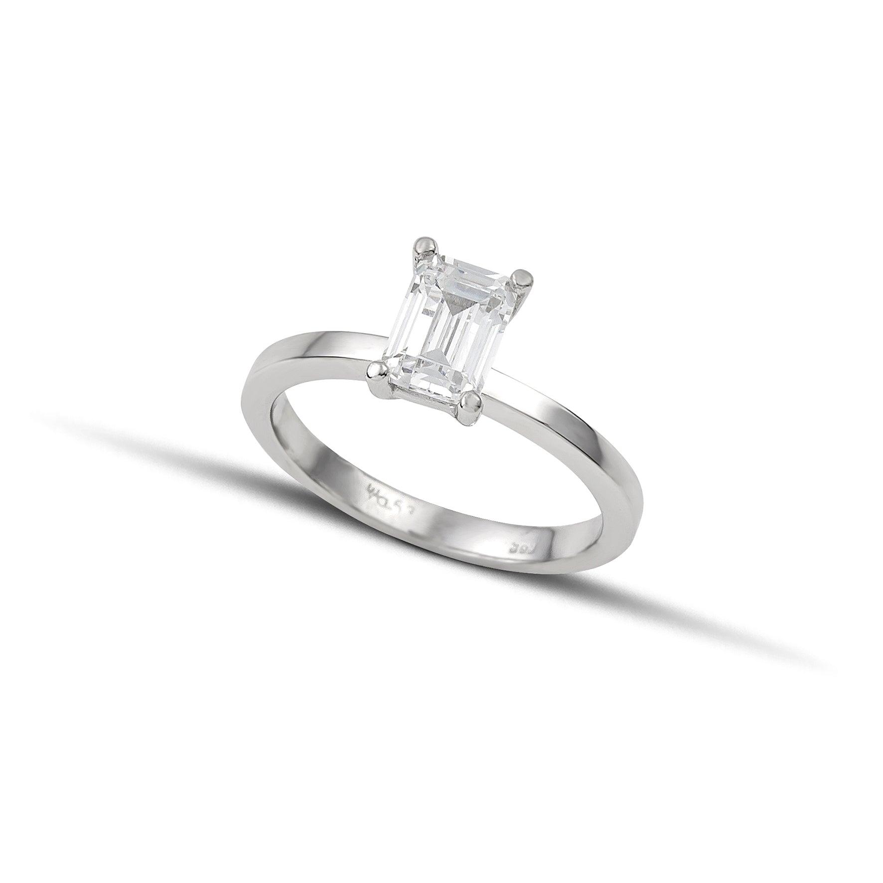 Λευκόχρυσο μονόπετρο δαχτυλίδι με διαμάντι σε τετράγωνο σχήμα baguette