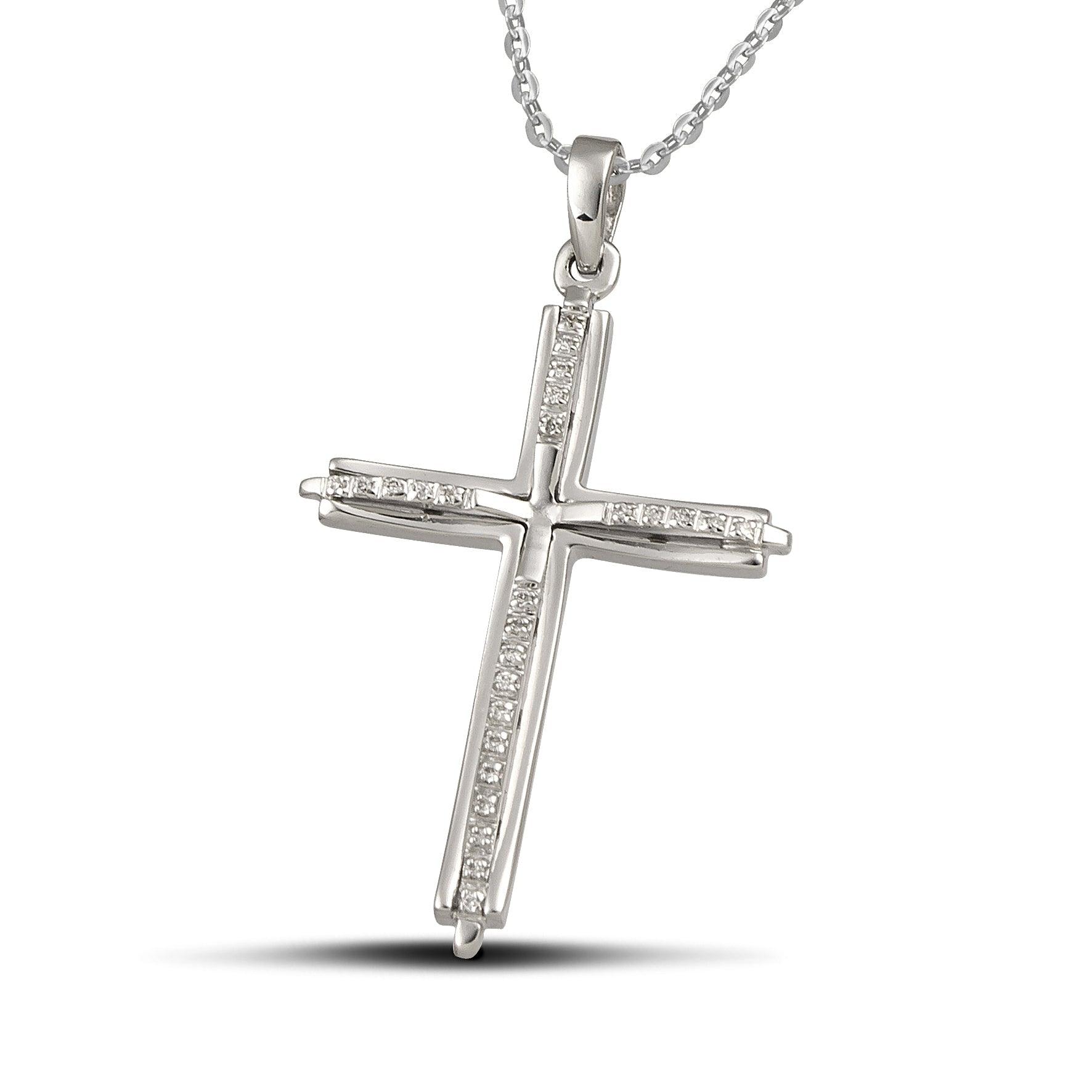 Γυναικείος σταυρός από λευκόχρυσο Κ18 με διαμάντια, περασμένος σε αλυσίδα.
