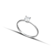 Μονόπετρο δαχτυλίδι γάμου με κεντρικό διαμάντι σε καστόνι σχήματος 