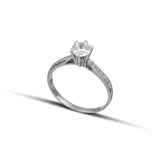 Μονόπετρο δαχτυλίδι OS010 από λευκόχρυσο 14Κ με κεντρικό ζιργκόν  με καρφωτές πέτρες και κομψή διαχρονική γραμμή.