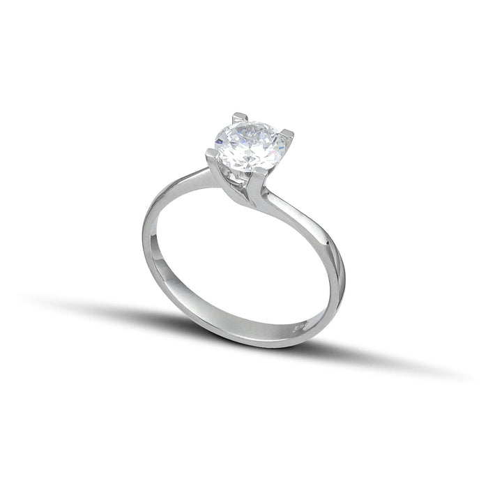 Λευκόχρυσο μονόπετρο με διαμάντι και δέσιμο φλόγας.