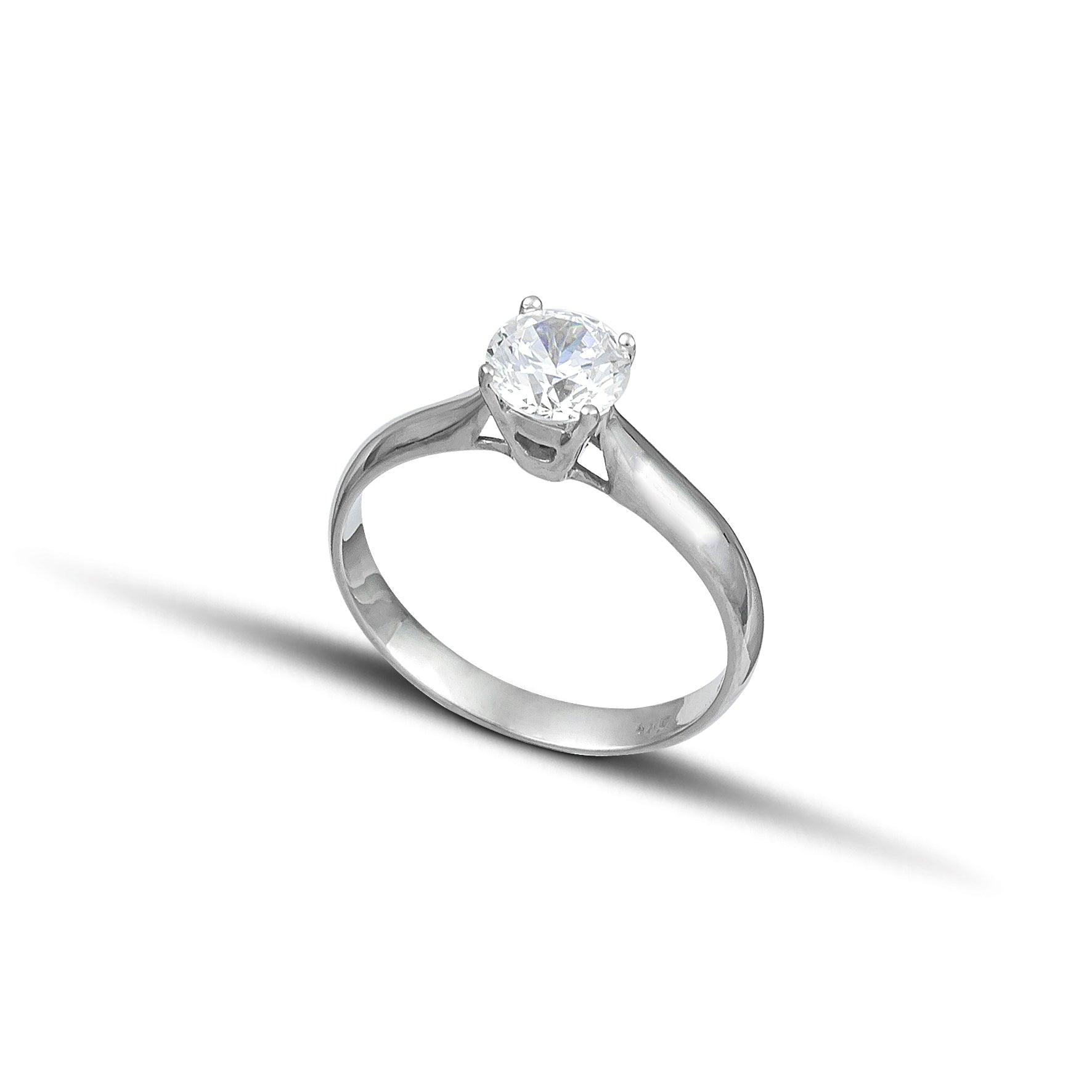 Λευκόχρυσο μονόπετρο δαχτυλίδι με διαμάντι.