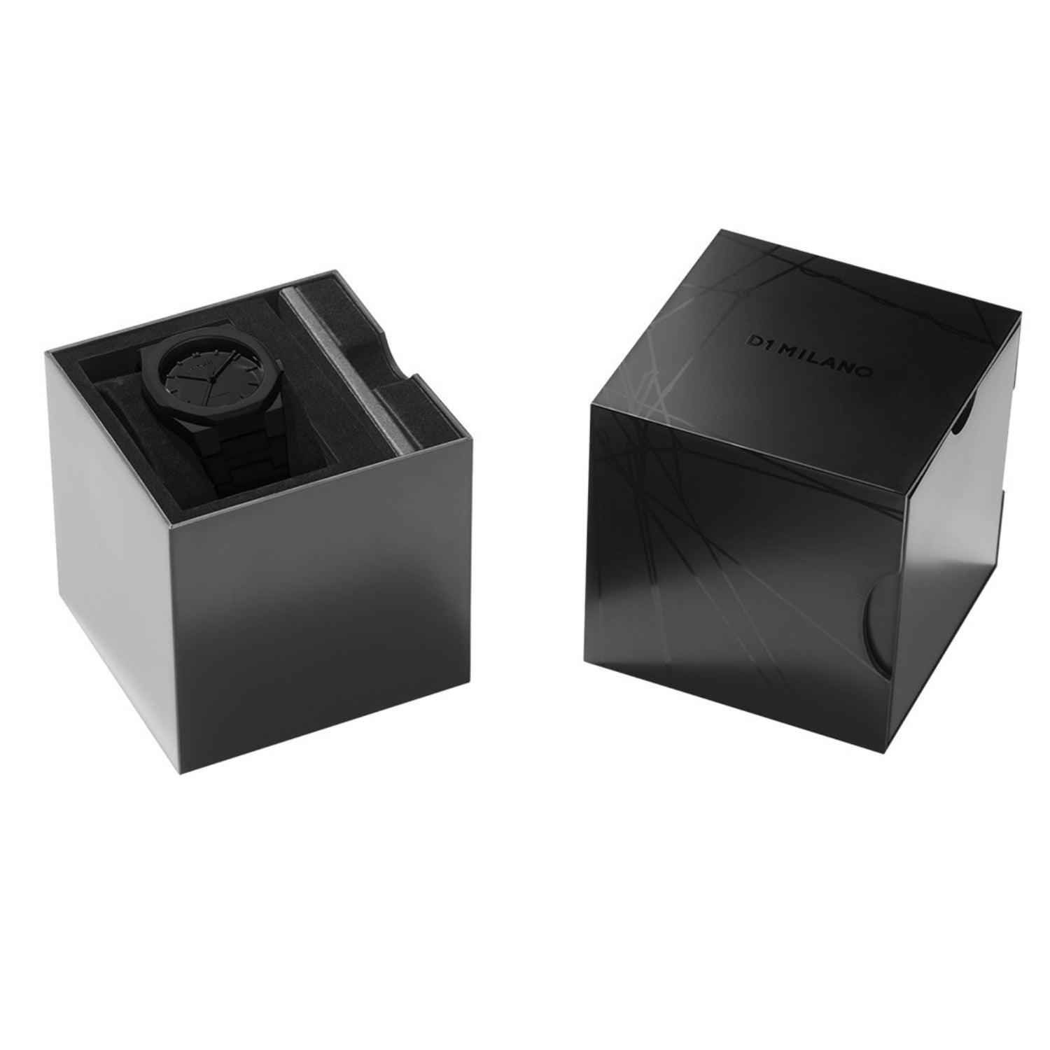 Ρολόι D1 Milano με μαύρο μπρασελέ και μαύρο καντράν σε πεντάγωνο σχήμα διαμέτρου 40.5 mm σε συσκευασία δώρου.