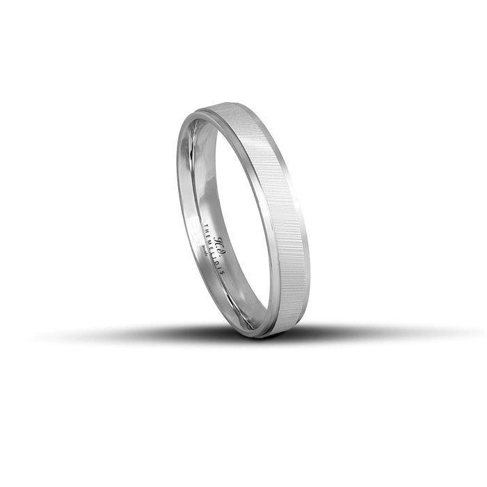 Λευκόχρυσες βέρες γάμου 4mm με διαμανταρισμένη επιφάνεια, χειροποίητης κατασκευής με ανατομικό σχεδιασμό.