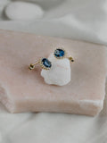 Χρυσά σκουλαρίκια Κ14 ροζέτα με μπλε πέτρα