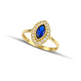 Χρυσό δαχτυλίδι Κ14, Οβάλ ροζέτα με λευκά ζιργκόν και μπλε πέτρα στο κέντρο. 