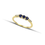 Δαχτυλίδι μισόβερο από χρυσό Κ14 με μπλε και λευκά ζιργκόν.