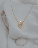 Χρυσό γυναικείο κολιέ 14Κ με καρδιά, κορώνα και ζιργκόν NL019.